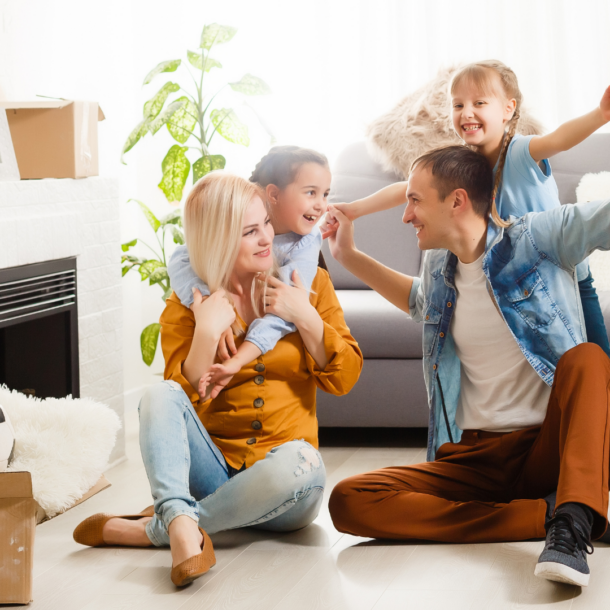 happy family of 4 in house